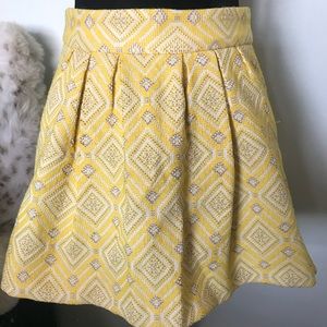 Yellow brocade skirt with pockets